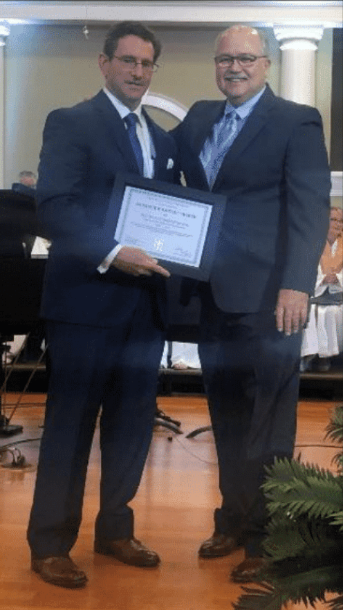 Presentation of a commemorative plaque at Burnsview’s centennial celebration